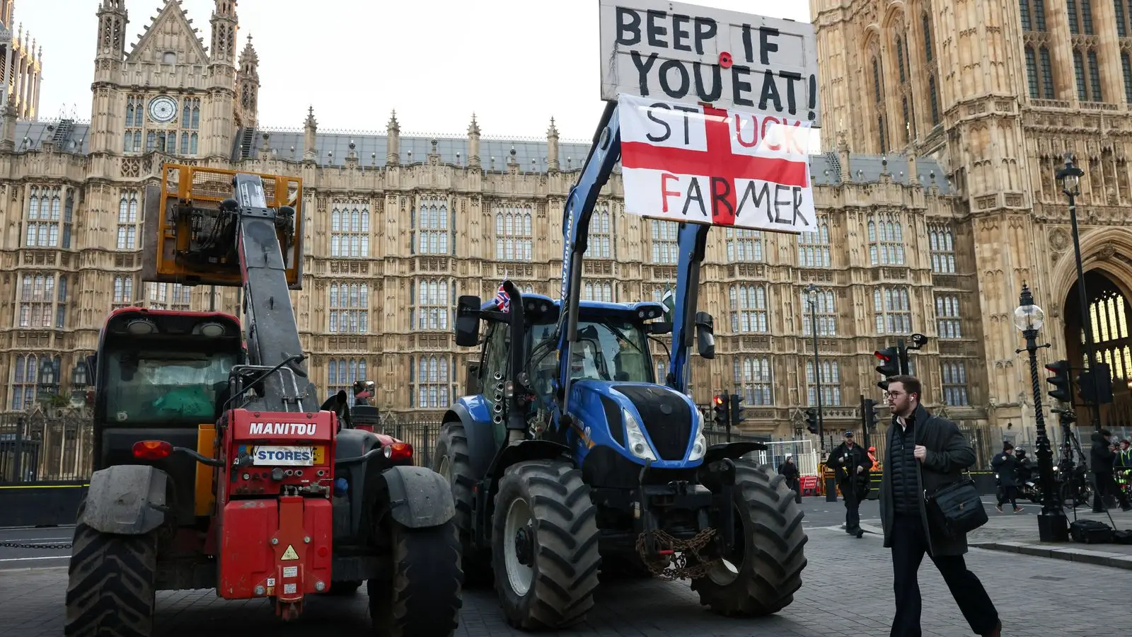 Tractors with protest banner parked in front of Parliament building in London during farmer demonstration